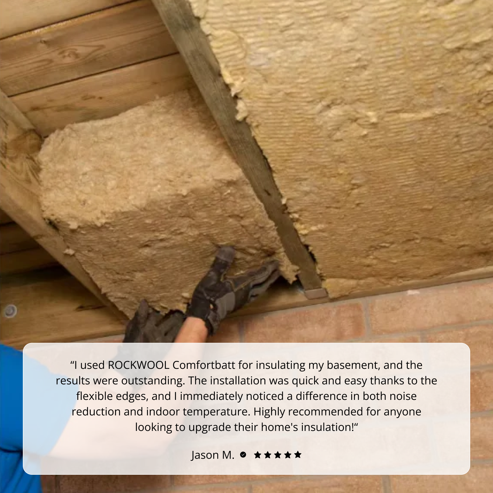 Wearing gloves, a person installs Rockwool COMFORTBATT R23 (5.5" x 15.25" x 47", 39.82 sq ft) between ceiling beams. A testimonial below highlights the stone wool insulation's fire resistance.